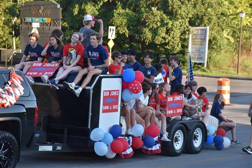 Bob Jones Swim and Dive Team on float